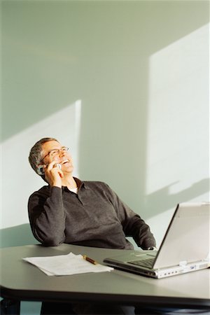 simsearch:700-00522448,k - Businessman In Office Talking On Cell Phone Stock Photo - Rights-Managed, Code: 700-00529585