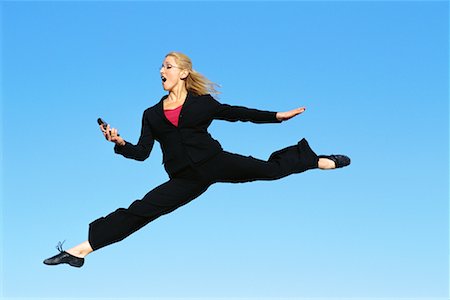 Businesswoman Jumping Foto de stock - Con derechos protegidos, Código: 700-00529918