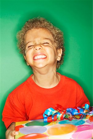 simsearch:700-00519099,k - Portrait of Boy Holding Gift Stock Photo - Rights-Managed, Code: 700-00520550