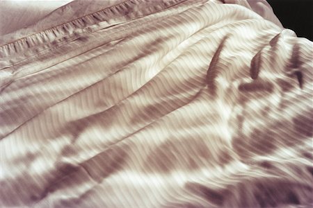 Morning Light on Bed Sheets Stock Photo - Rights-Managed, Code: 700-00520903