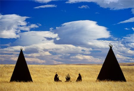 Silhouette of Native Americans And Teepees, Alberta, Canada Foto de stock - Con derechos protegidos, Código: 700-00520959