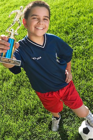 Boy with Soccer Ball and Trophy Stock Photo - Rights-Managed, Code: 700-00521016