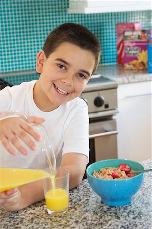 simsearch:700-00592522,k - Boy Eating Breakfast Stock Photo - Rights-Managed, Code: 700-00521021