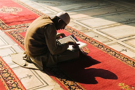 Person Reading Koran in Jama Masjid Mosque, Delhi, India Stock Photo - Rights-Managed, Code: 700-00521092