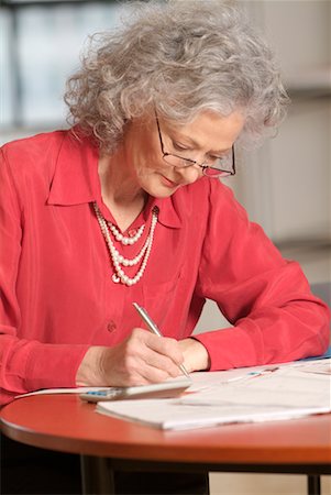 Woman with Paperwork Stock Photo - Rights-Managed, Code: 700-00521481