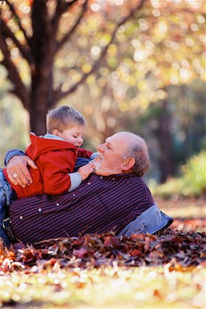 Grandfather and Grandson Outdoors in Autumn Foto de stock - Con derechos protegidos, Código: 700-00522336