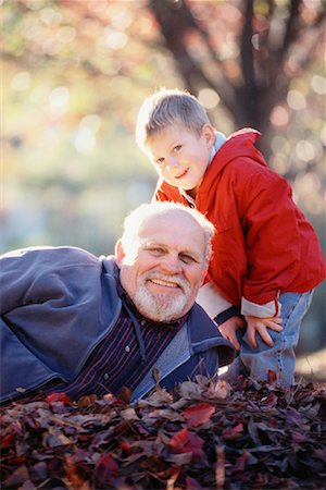 Grandfather and Grandson Outdoors in Autumn Foto de stock - Con derechos protegidos, Código: 700-00522337