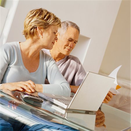 Couple Looking at Bills Stock Photo - Rights-Managed, Code: 700-00522440