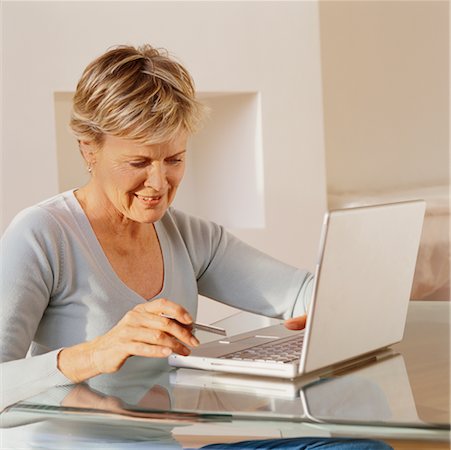 senior online shopping - Woman Using Laptop Computer Stock Photo - Rights-Managed, Code: 700-00522441