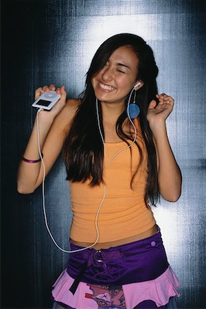 Teenager Listening to IPod Stock Photo - Rights-Managed, Code: 700-00522562