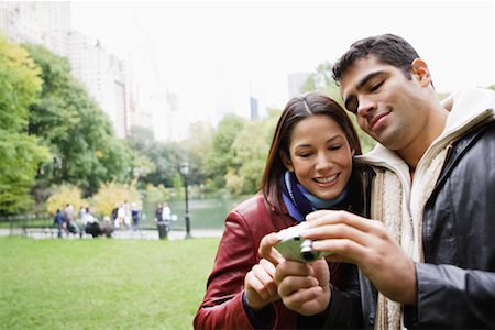 Couple Reviewing Pictures on Digital Camera Stock Photo - Rights-Managed, Code: 700-00522645