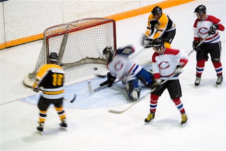 simsearch:700-00522765,k - Match de hockey Photographie de stock - Rights-Managed, Code: 700-00522751