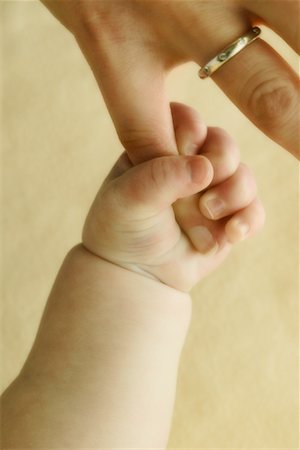 Mother and Baby's Hands Stock Photo - Rights-Managed, Code: 700-00523099