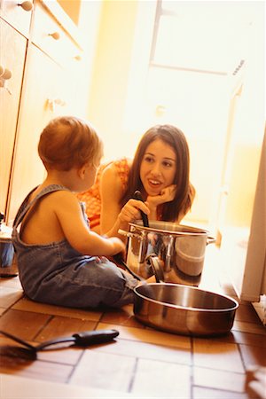 Mother Playing with Baby on Kitchen Floor Stock Photo - Rights-Managed, Code: 700-00523164