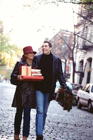 quaint american street scene - Couple Carrying Christmas Gifts, Greenwich Village, New York, USA Stock Photo - Rights-Managed, Code: 700-00523218