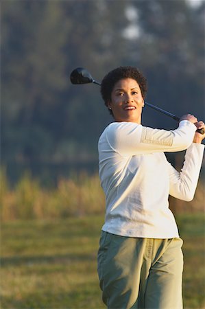 Portrait of Woman Playing Golf Stock Photo - Rights-Managed, Code: 700-00523331