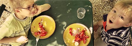 family meal overhead - Children Eating Outdoors Stock Photo - Rights-Managed, Code: 700-00523513