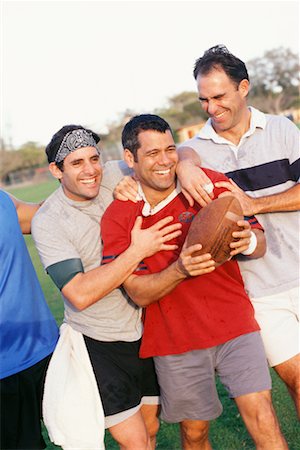 football player curly hair - Men After Playing Football Stock Photo - Rights-Managed, Code: 700-00523722