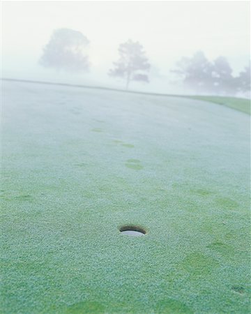 Footprints on Frosty Putting Green Stock Photo - Rights-Managed, Code: 700-00523804