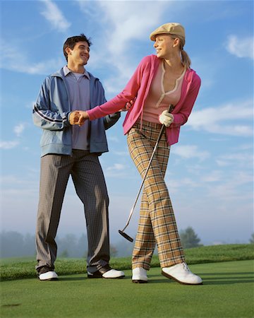 flirt tug - Couple at Golf Course Stock Photo - Rights-Managed, Code: 700-00523812