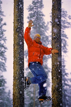 Man Climbing Tree Stock Photo - Rights-Managed, Code: 700-00530168