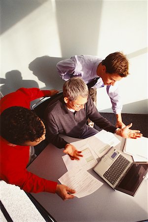 simsearch:6118-09129966,k - Businessmen Working Together Stock Photo - Rights-Managed, Code: 700-00530531
