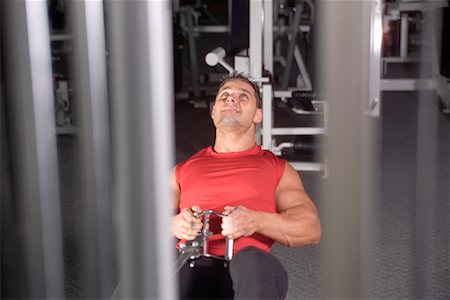 simsearch:649-08085027,k - Man Using Weight Machine In Gym Foto de stock - Con derechos protegidos, Código: 700-00530572