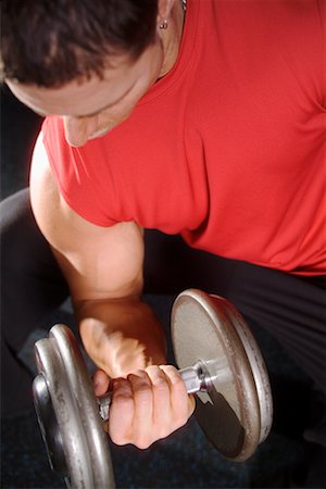 simsearch:853-07241927,k - Man Using Dumb-bell In Gym Stock Photo - Rights-Managed, Code: 700-00530582