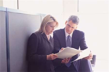 Business People Looking at Paperwork Stock Photo - Rights-Managed, Code: 700-00530634