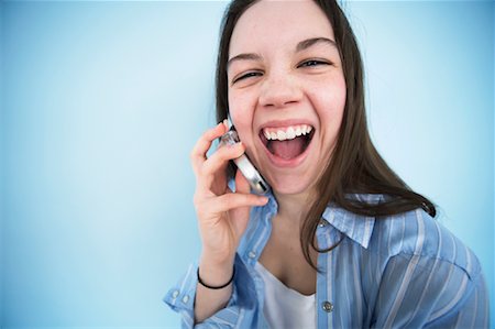 Portrait of Teenager on Phone Stock Photo - Rights-Managed, Code: 700-00530709