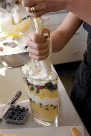 photos of blueberries for kitchen - Woman's Hands Making Dessert Stock Photo - Rights-Managed, Code: 700-00544165