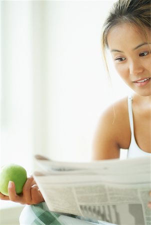 simsearch:700-00520582,k - Woman Reading Newspaper Stock Photo - Rights-Managed, Code: 700-00544293