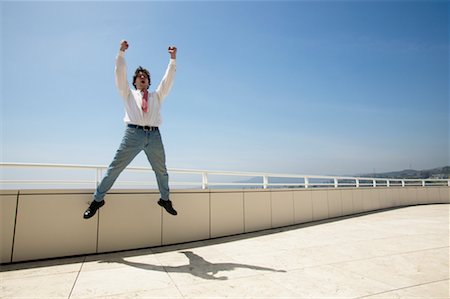 Businessman Jumping for Joy Foto de stock - Direito Controlado, Número: 700-00546285