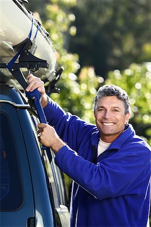 portrait and kayak - Man Fastening Kayak to Car Roof Stock Photo - Rights-Managed, Code: 700-00546649