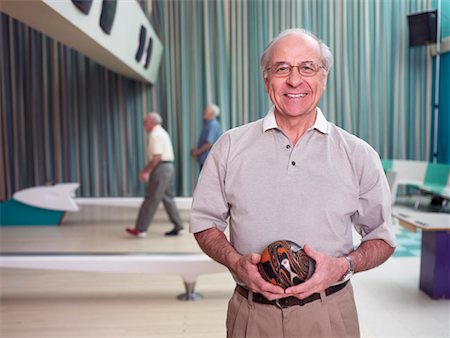 Portrait of Man In Bowling Alley Stock Photo - Rights-Managed, Code: 700-00549131