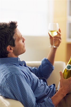 dégustateur de vin (homme et femme) - Homme inspectant vin Photographie de stock - Rights-Managed, Code: 700-00549309