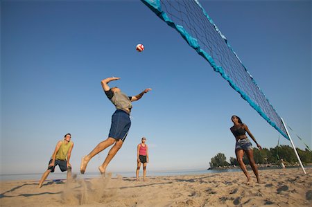 simsearch:700-00366130,k - People Playing Beach Volleyball Stock Photo - Rights-Managed, Code: 700-00549426