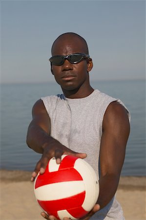 Man Playing Beach Volleyball Stock Photo - Rights-Managed, Code: 700-00549431