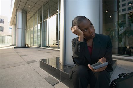 single bald women - Businesswoman with Electronic Organizer Stock Photo - Rights-Managed, Code: 700-00549512