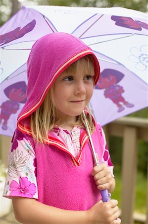 rain little girl - Girl Outdoors with Umbrella Foto de stock - Con derechos protegidos, Código: 700-00549716