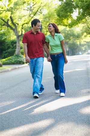 simsearch:700-00549943,k - Couple Walking down Street Stock Photo - Rights-Managed, Code: 700-00549942