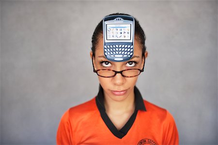 eyeglasses forehead - Portrait of Woman with Electronic Organizer Stock Photo - Rights-Managed, Code: 700-00554294