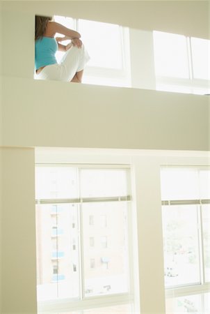 Woman Sitting on Ceiling Beam Stock Photo - Rights-Managed, Code: 700-00554478
