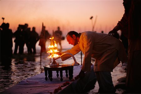 simsearch:700-00521091,k - Man Lighting Candle, Allahbad, India Stock Photo - Rights-Managed, Code: 700-00554584