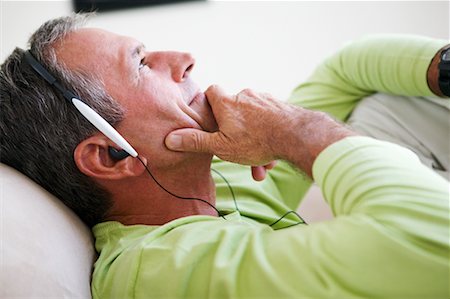 simsearch:600-02121627,k - Man Listening to Music Stock Photo - Rights-Managed, Code: 700-00554679