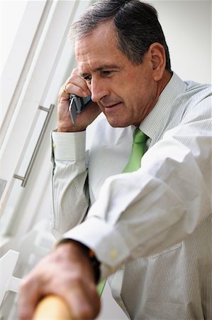 simsearch:700-00159009,k - Businessman with Cellular Phone Stock Photo - Rights-Managed, Code: 700-00554684
