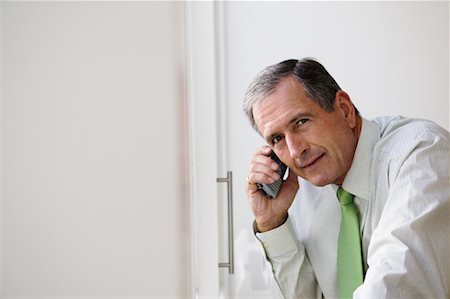 simsearch:700-00522448,k - Businessman with Cellular Phone Stock Photo - Rights-Managed, Code: 700-00554683