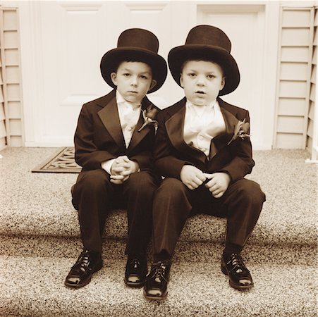 Brothers in Tuxedos on Doorstep Stock Photo - Rights-Managed, Code: 700-00555063