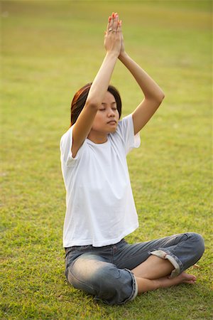 Woman Doing Yoga in City Park Stock Photo - Rights-Managed, Code: 700-00555117