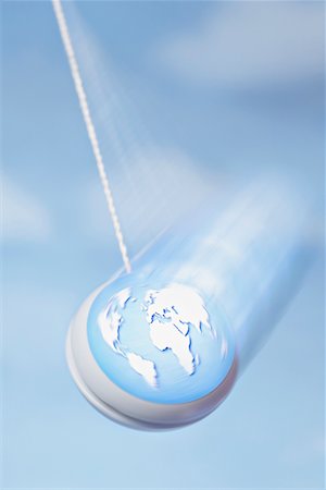 pendulum - World Map on Yo-yo Stock Photo - Rights-Managed, Code: 700-00555111